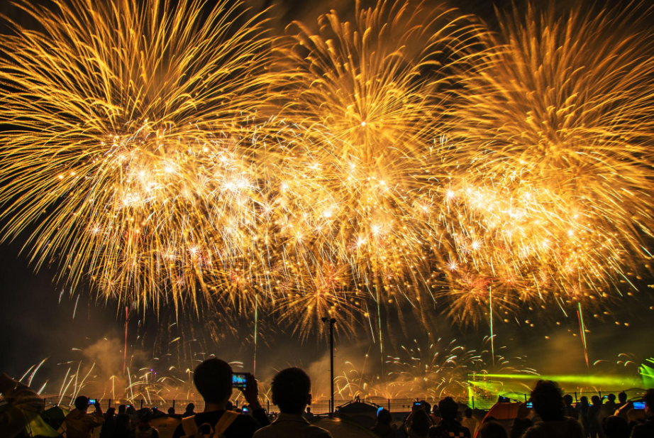 Happy family celebrating with safe fireworks
